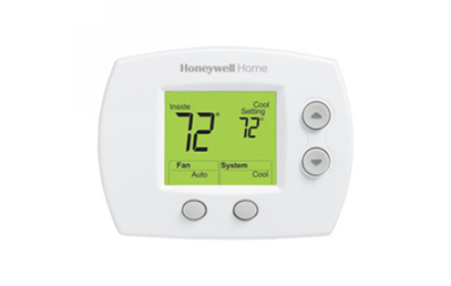 A white Honeywell Home digital thermostat, commonly found in West Chester University housing, displays an inside temperature of 72°F and a cool setting of 72°F, with options for fan, system, and three control buttons on the right side.